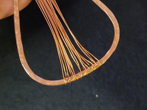 Jennifer Brooks's Rainbow Autumn Tree Earrings - , Contemporary Wire Jewelry, Dapping, Dapping Jewelry, How To Punch Holes, Hole Punching, Punch A Hole, Lashing, Wire Lashing, , leaving the free ends in the center of the tear drop